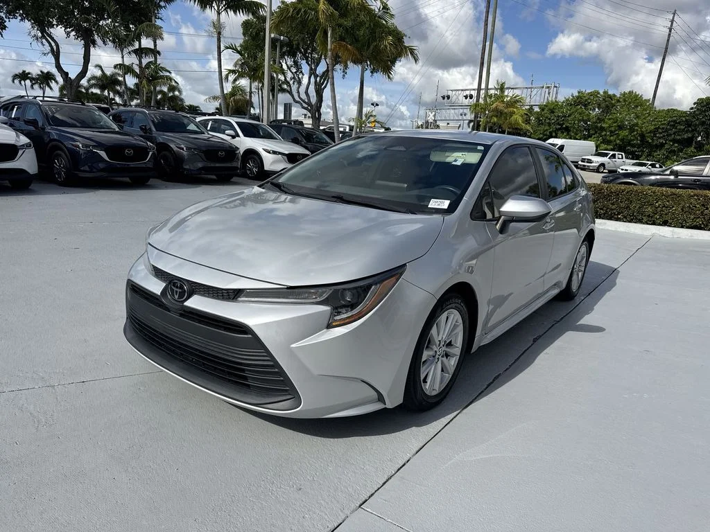Used 2023 Classic Silver Metallic Toyota LE image 9