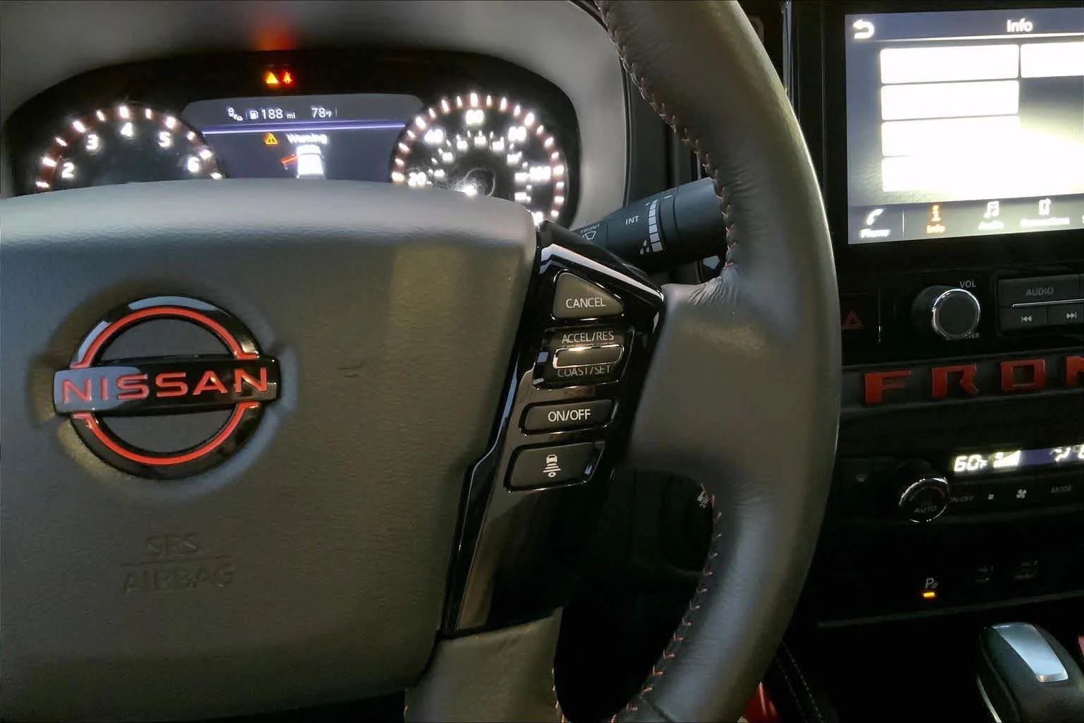 Used 2025 Afterburn Orange Nissan PRO-4X image 22