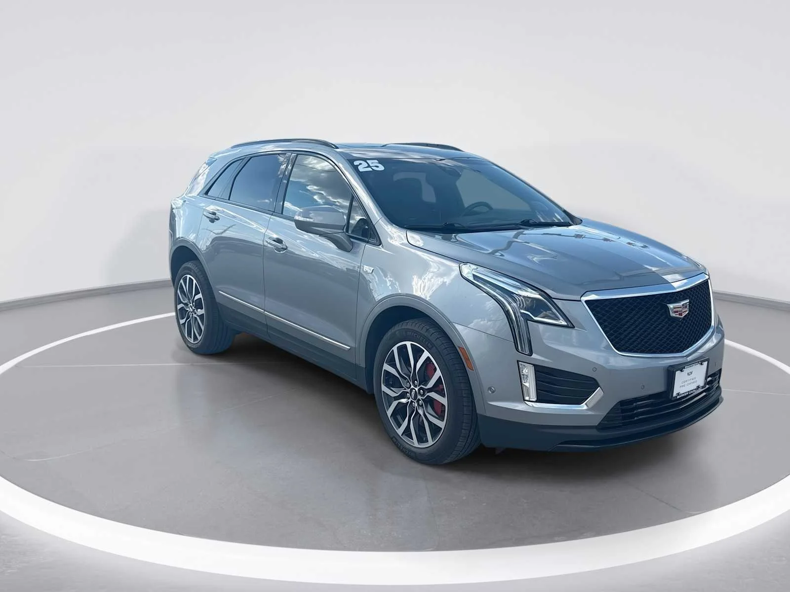 Used 2025 Argent Silver Metallic Cadillac Sport image 2