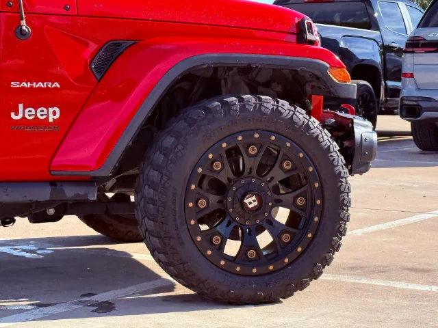 Used 2018 Red Jeep Unlimited Sahara image 4