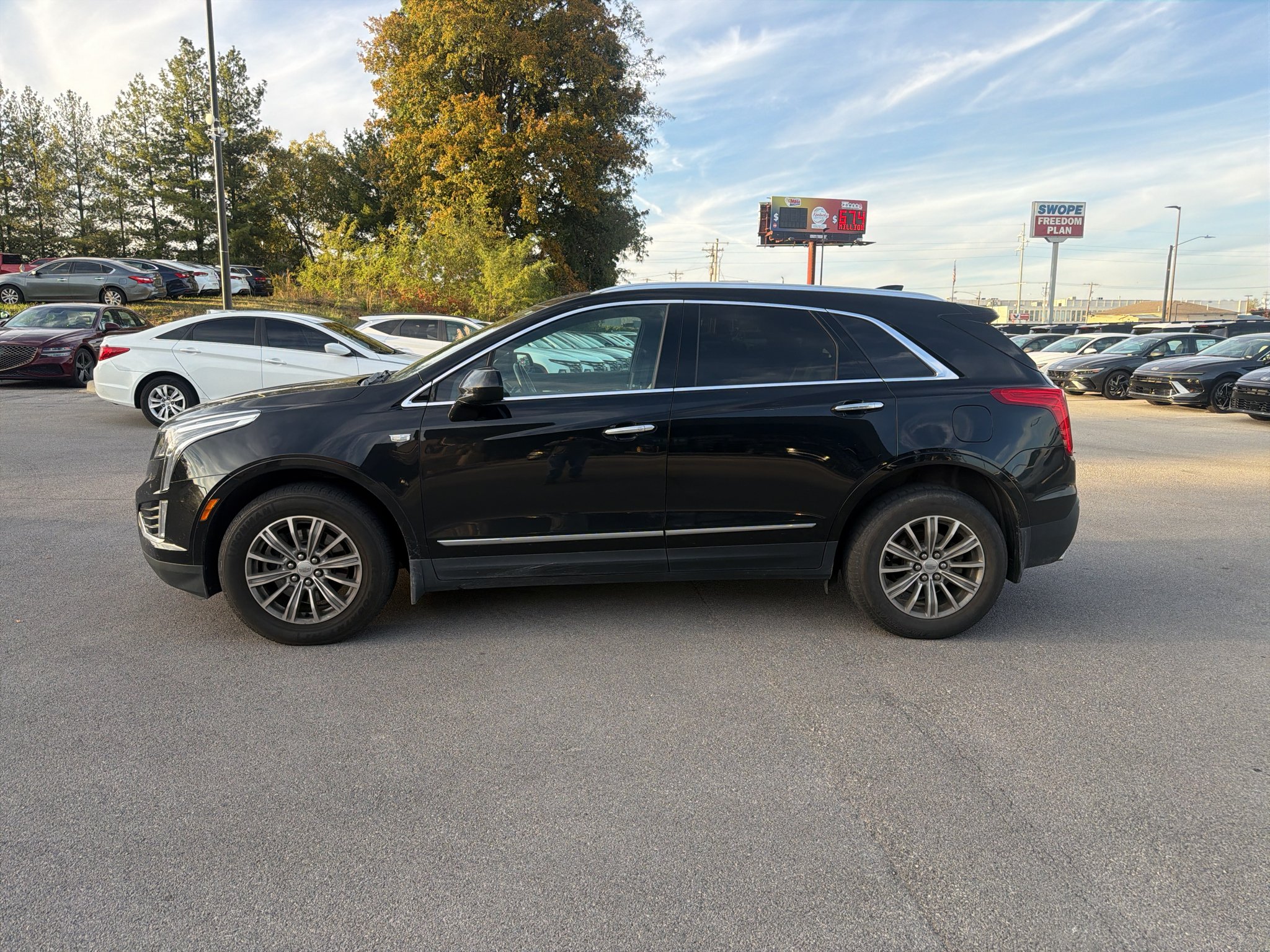 Used 2017 Stellar Black Metallic Cadillac Luxury AWD image 6