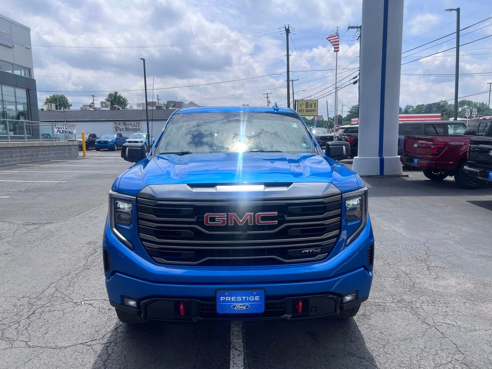 Used 2024 Blue Metallic GMC AT4 image 2