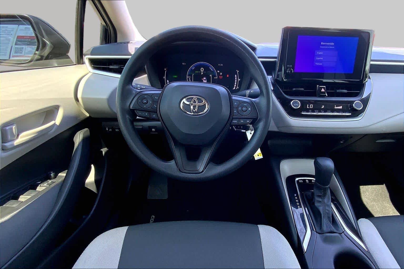 Used 2026 Midnight Black Metallic Toyota Hybrid LE image 6