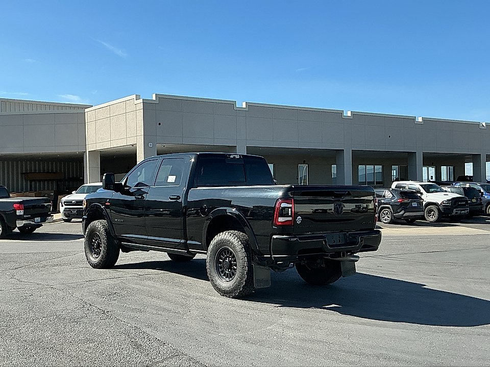 Used 2024 Diamond Black Crystal Pearlcoat Ram Limited Crew Cab 4x4 6