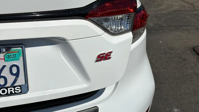 Used 2022 Black Sand Pearl Toyota SE image 11