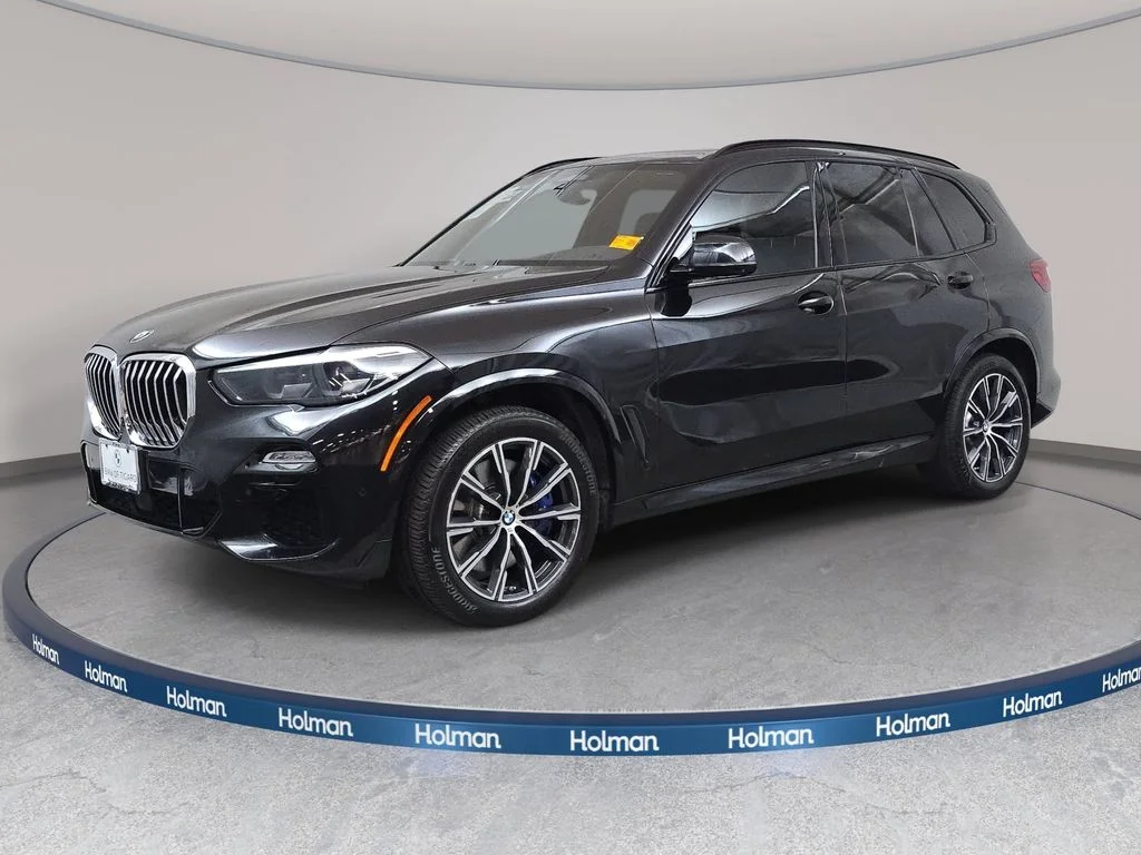 Used 2020 Black Sapphire Metallic BMW xDrive40i image 1