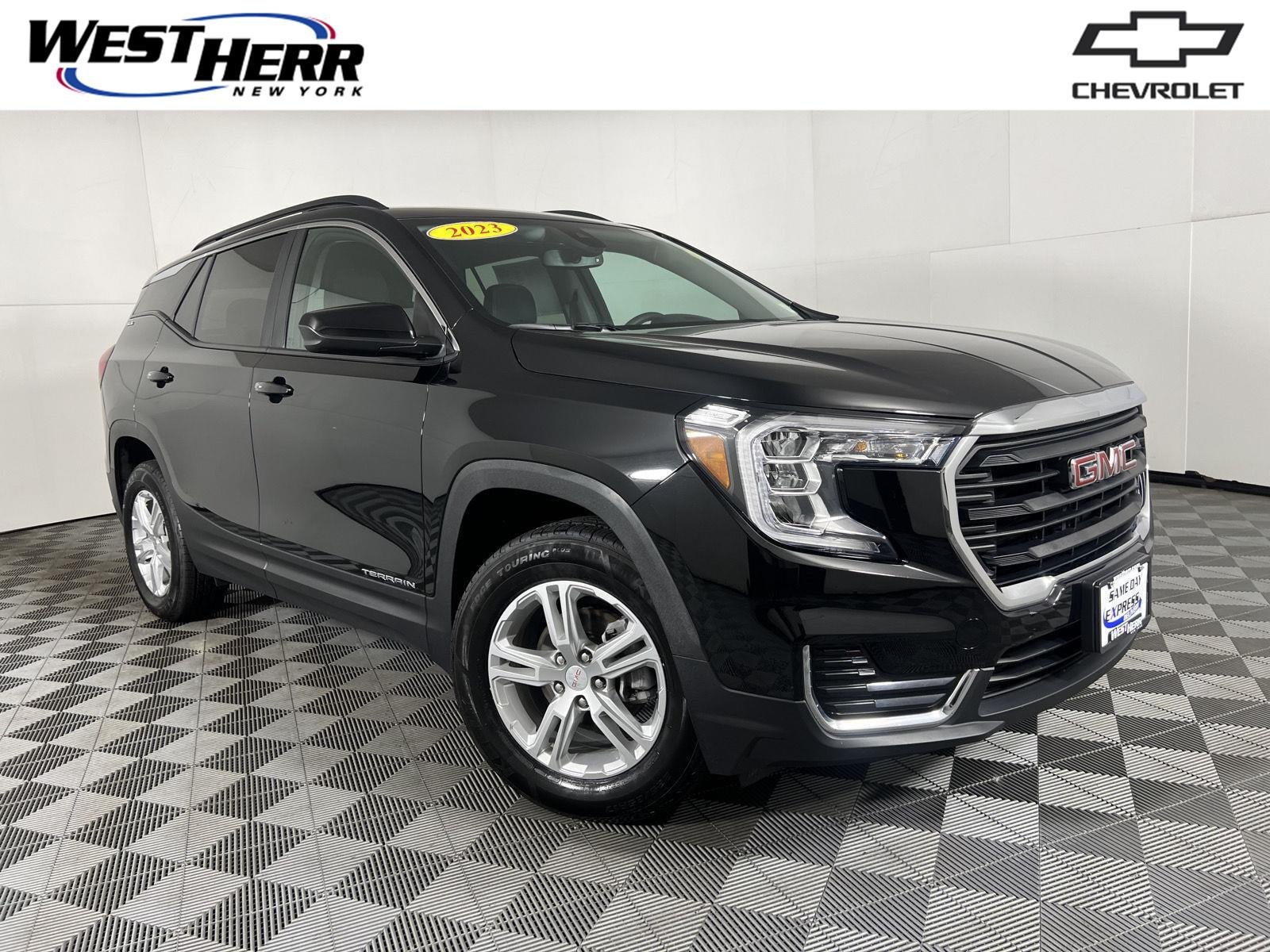 Used 2023 Ebony Twilight Metallic GMC SLE image 1