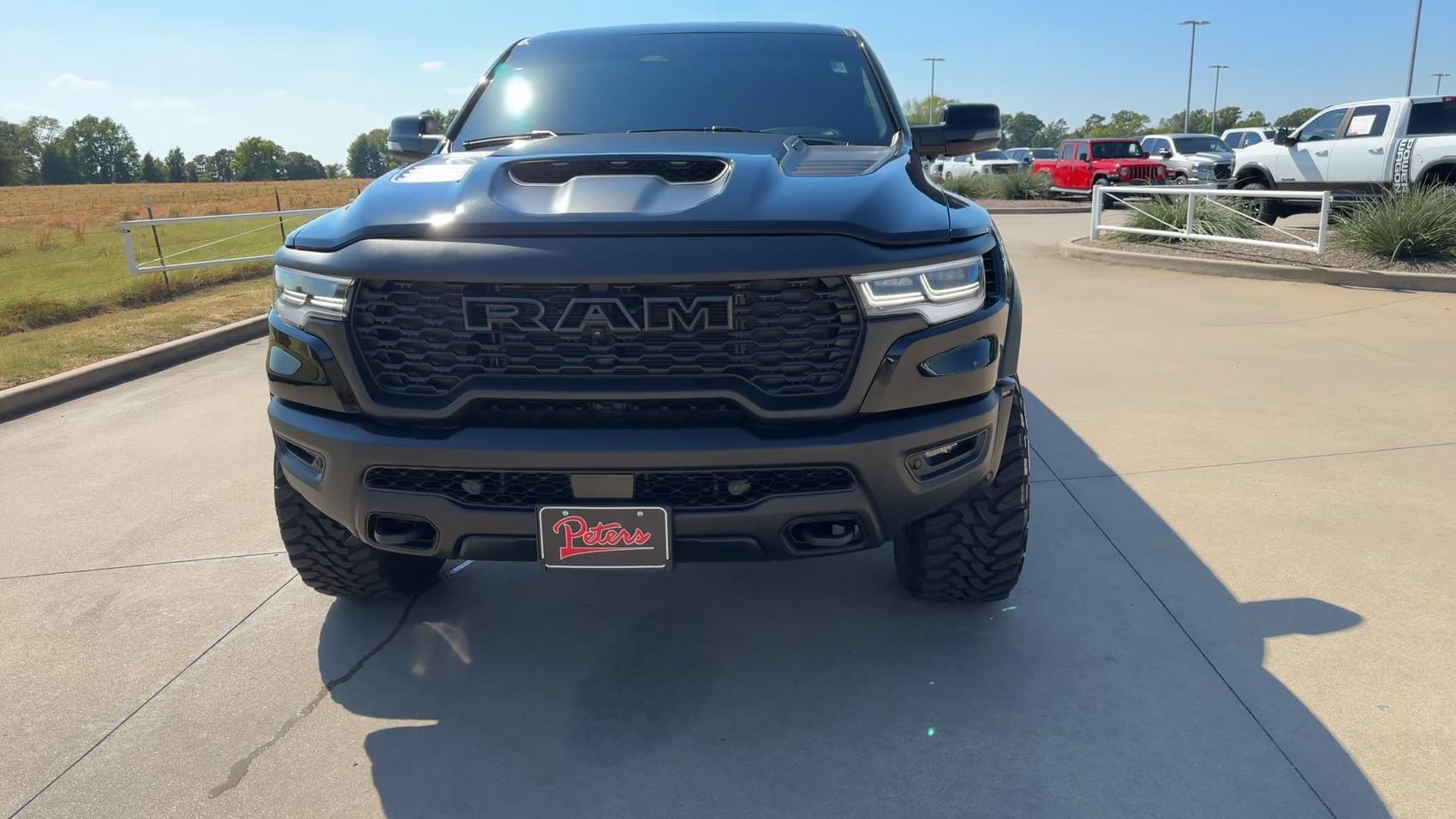 Used 2025 Diamond Black Crystal Pearlcoat Ram RHO image 4