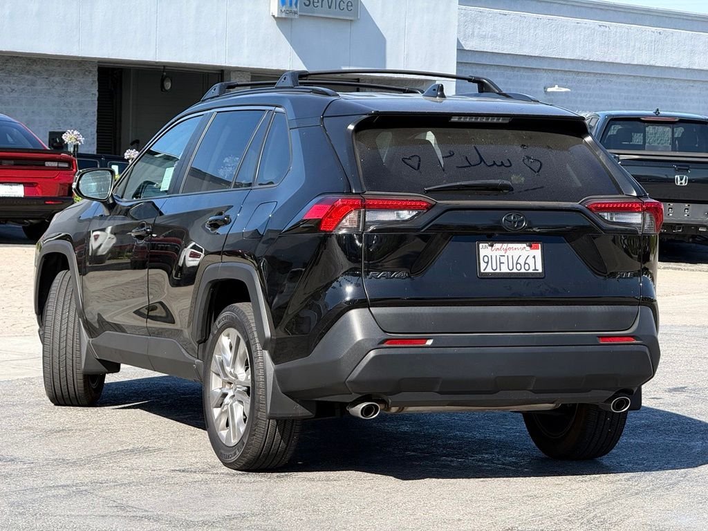 Used 2025 Midnight Black Metallic Toyota XLE Premium image 2