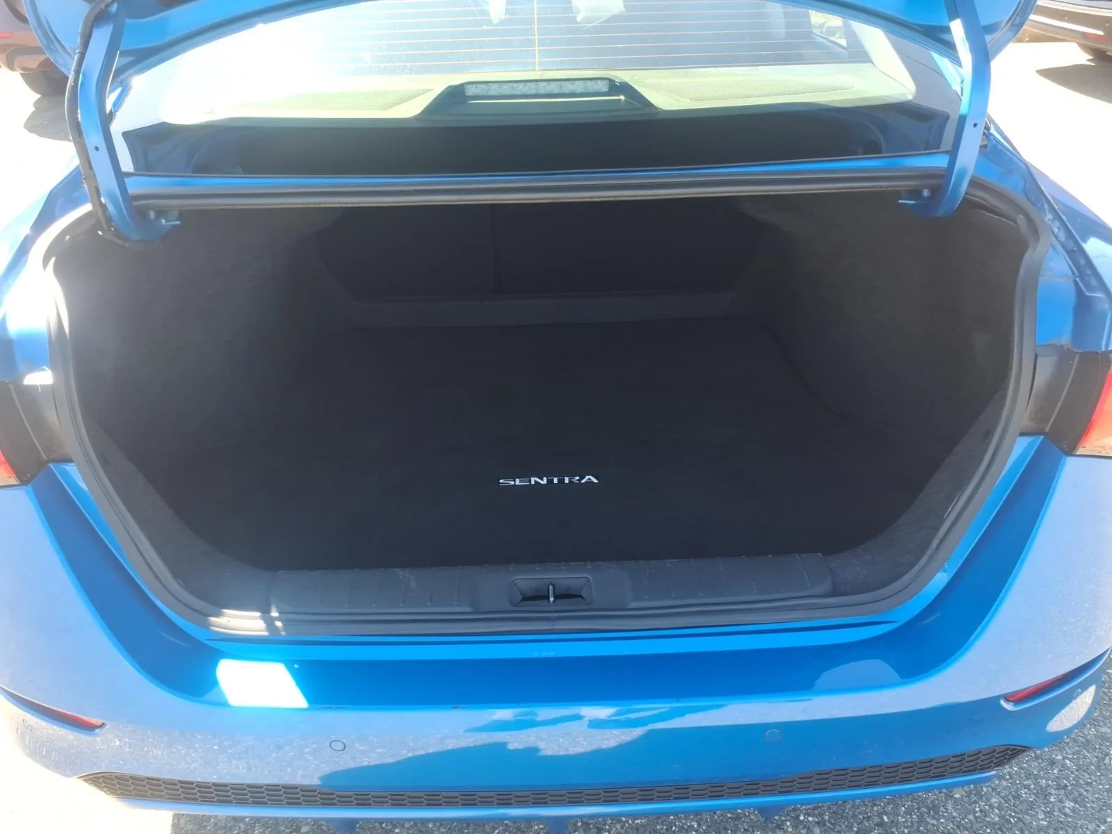 Used 2025 Electric Blue Metallic Nissan SV image 12