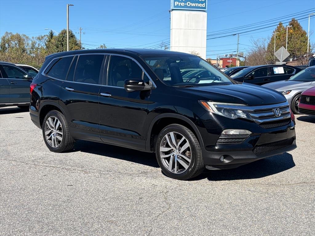 Used 2016 Crystal Black Pearl Honda EX-L image 1