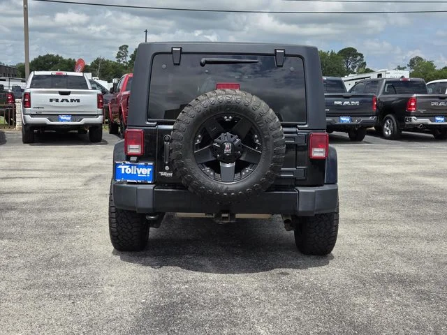 Used 2018 Black Jeep Unlimited Sahara image 6