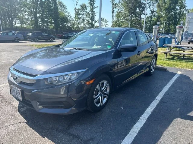 Used 2018 Cosmic Blue Metallic Honda LX image 1