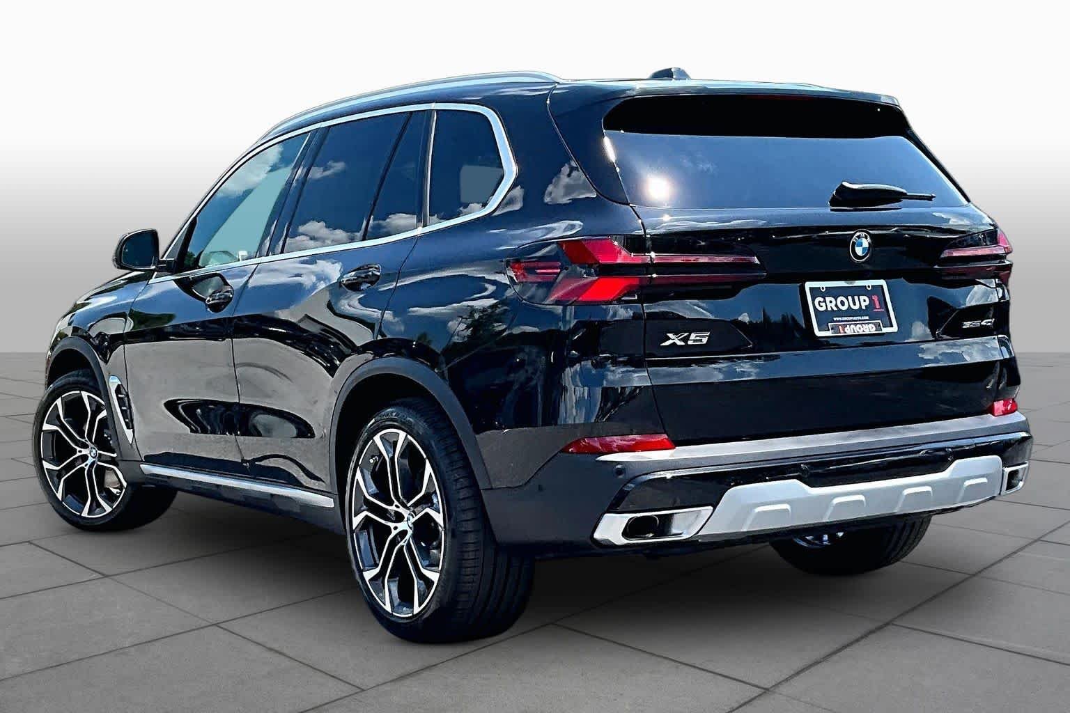 New 2026 Black Sapphire Metallic BMW sDrive40i image 12
