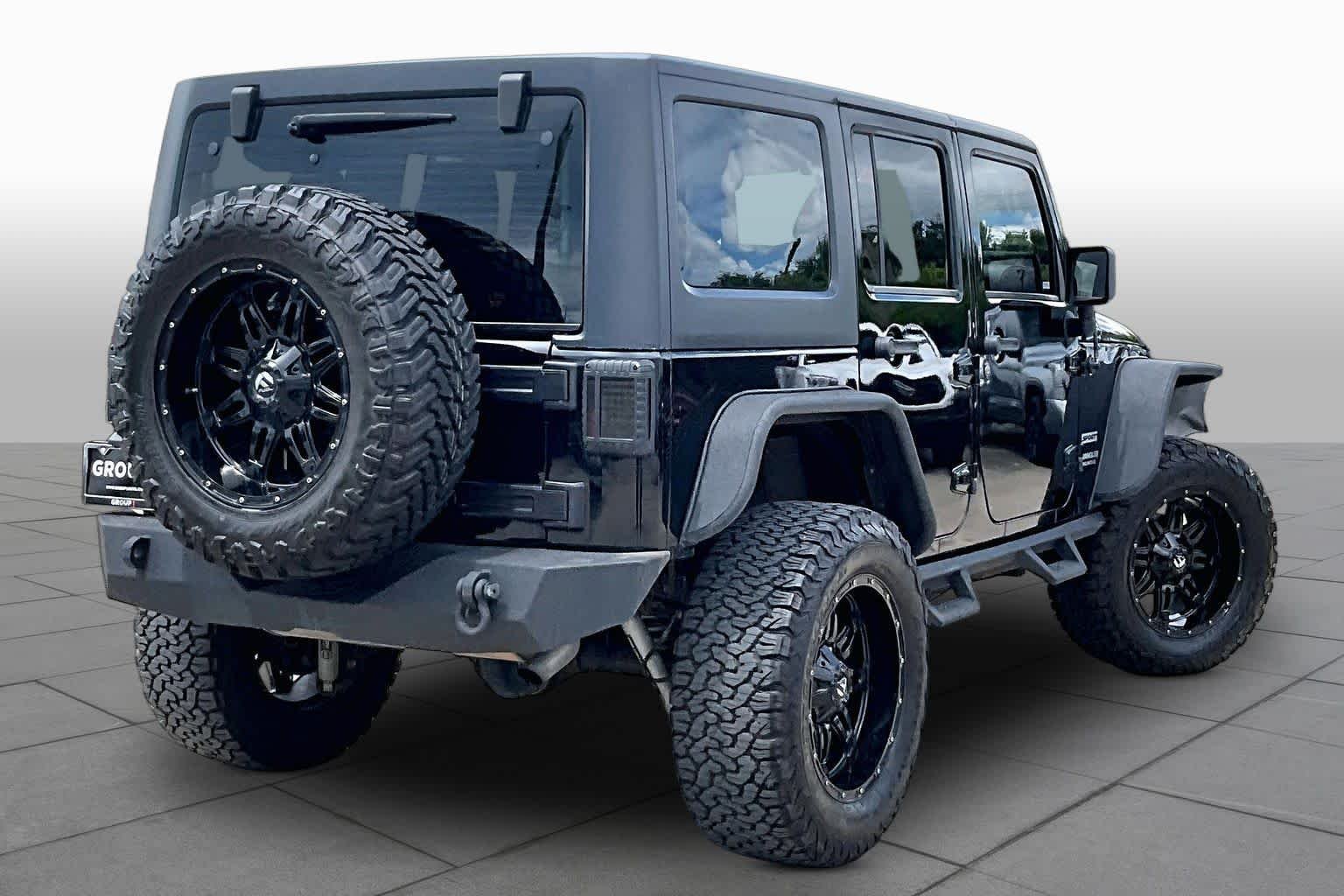Used 2014 Black Clearcoat Jeep Sport image 12