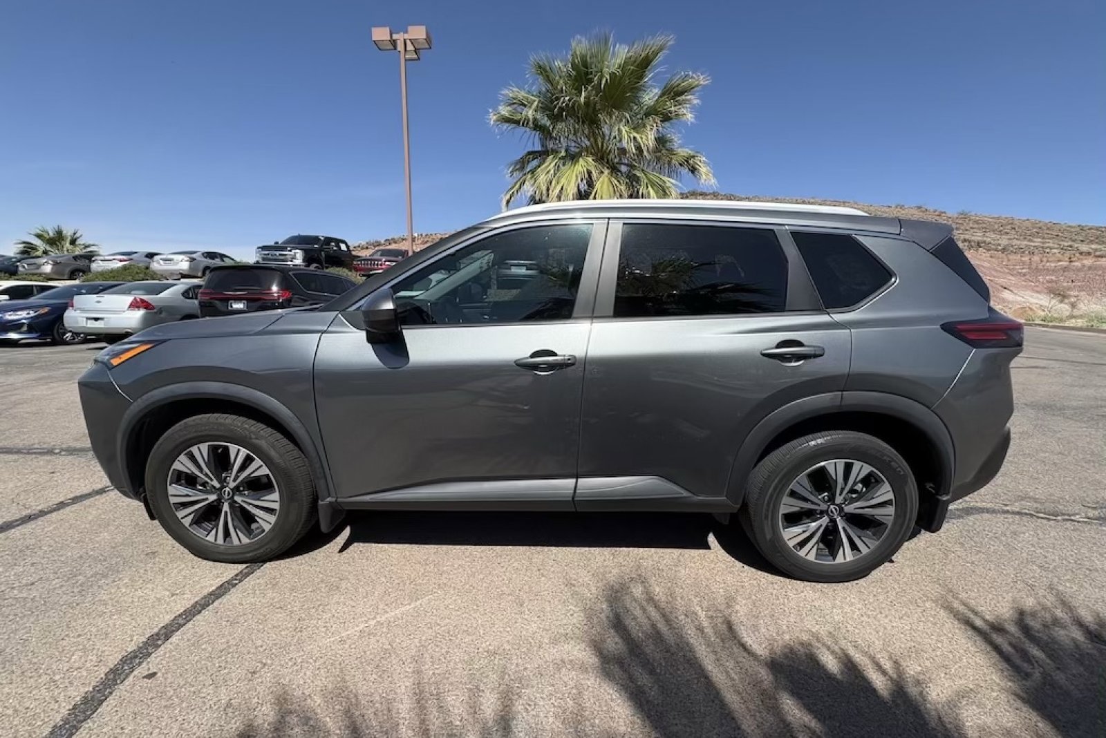Used 2023 Gun Metallic Nissan SV image 2