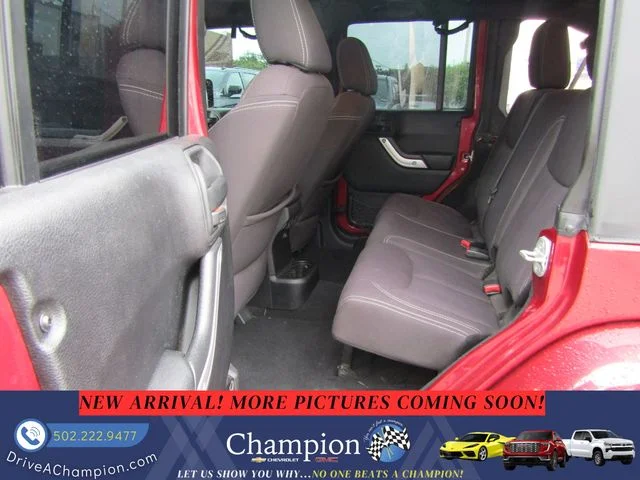 Used 2013 Red Jeep Unlimited Sahara image 8
