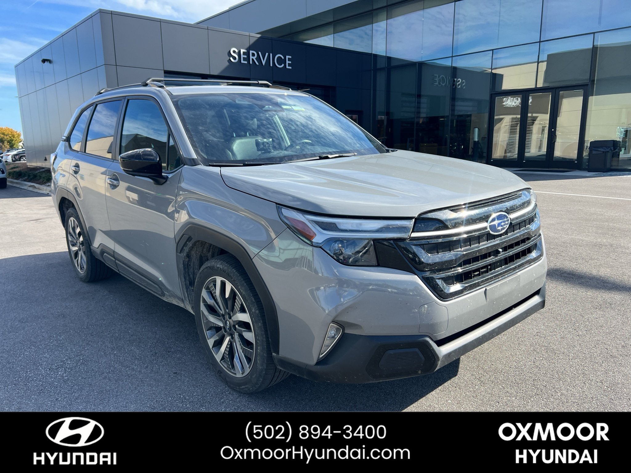 Used 2025 River Rock Pearl Subaru Touring image 1