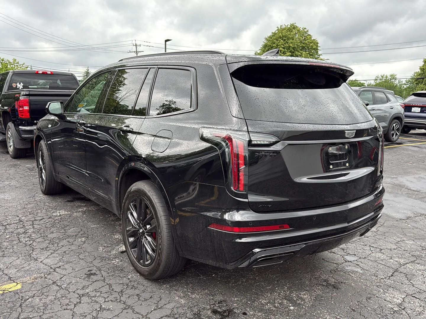 Used 2023 Stellar Black Metallic Cadillac AWD Sport image 3