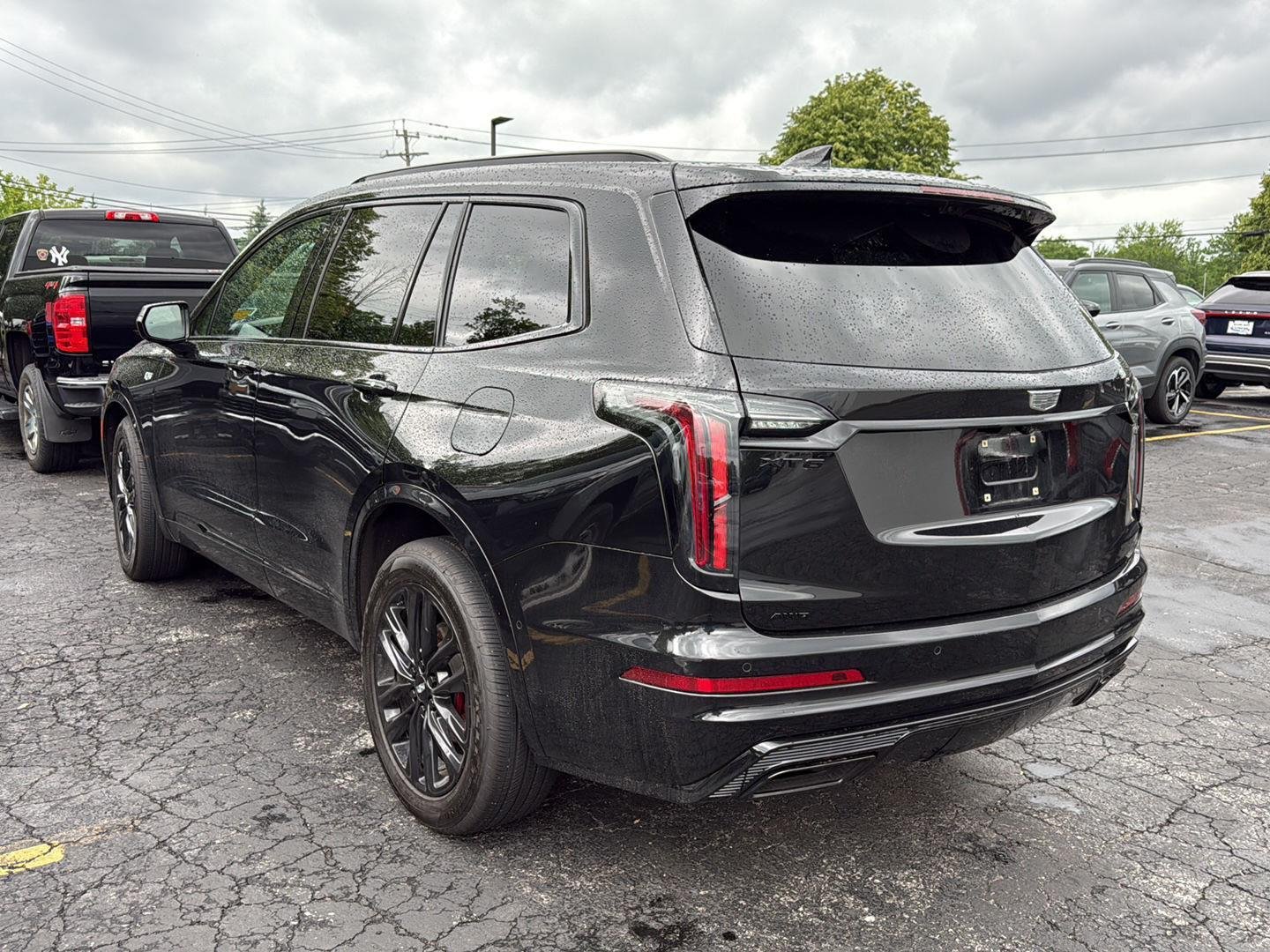 Used 2023 Stellar Black Metallic Cadillac AWD Sport image 3