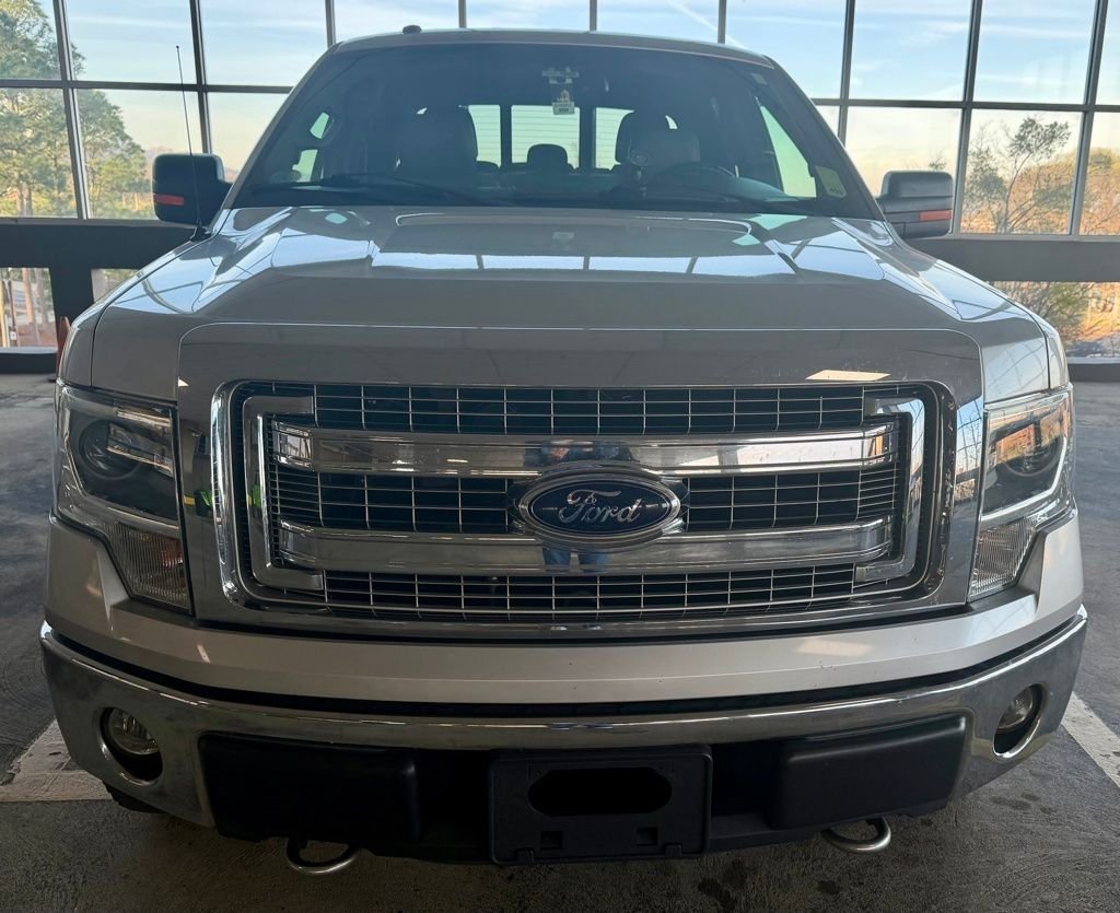 Used 2014 Ford F-150 XLT with VIN 1FTFW1EF7EFD02983 for sale in Arab, AL