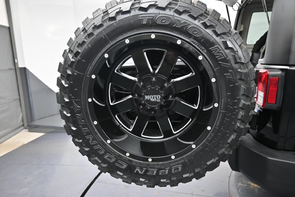 Used 2014 Black Clearcoat Jeep Unlimited Sport image 36