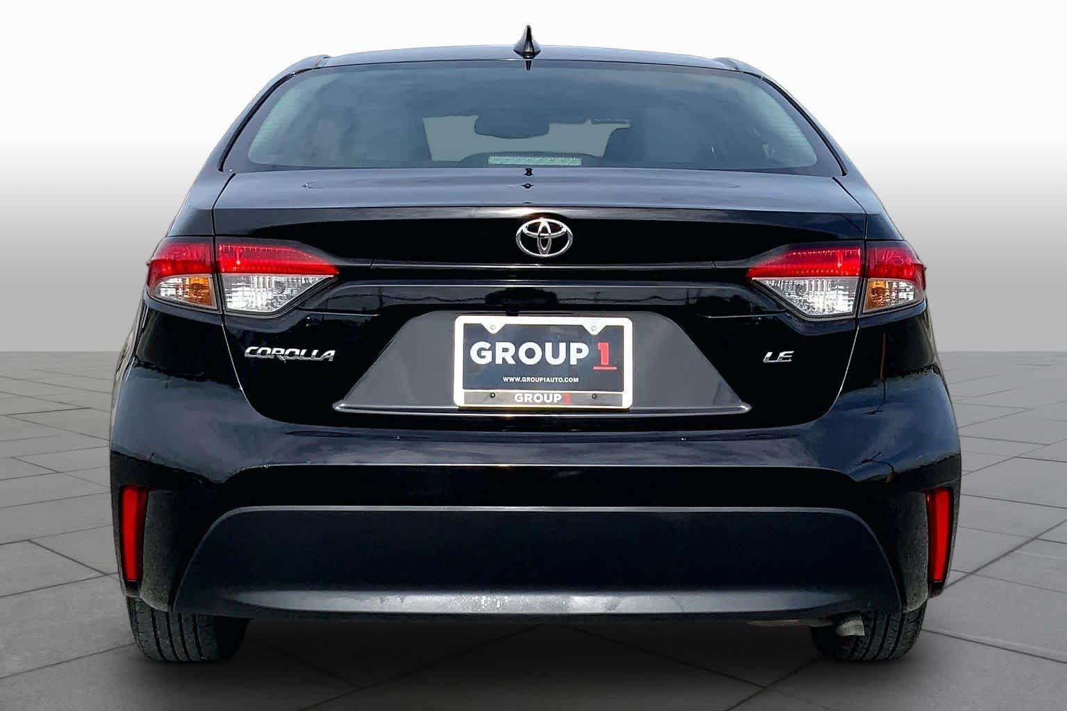 Used 2024 Midnight Black Metallic Toyota LE image 5
