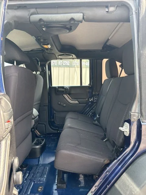 Used 2013 Blue Jeep Unlimited Sport image 14