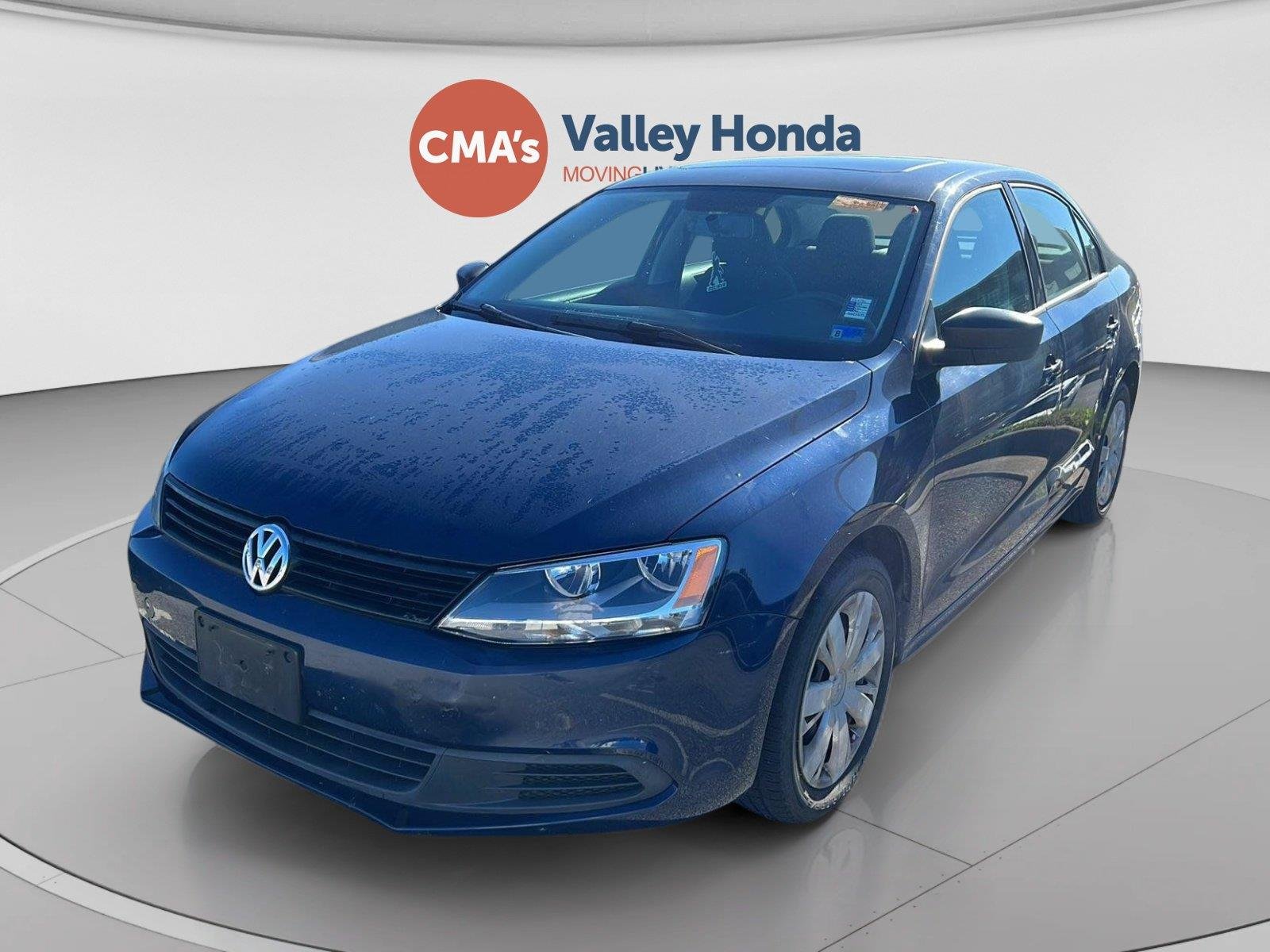 Used 2012 Tempest Blue Metallic Volkswagen S w/Sunroof image 1