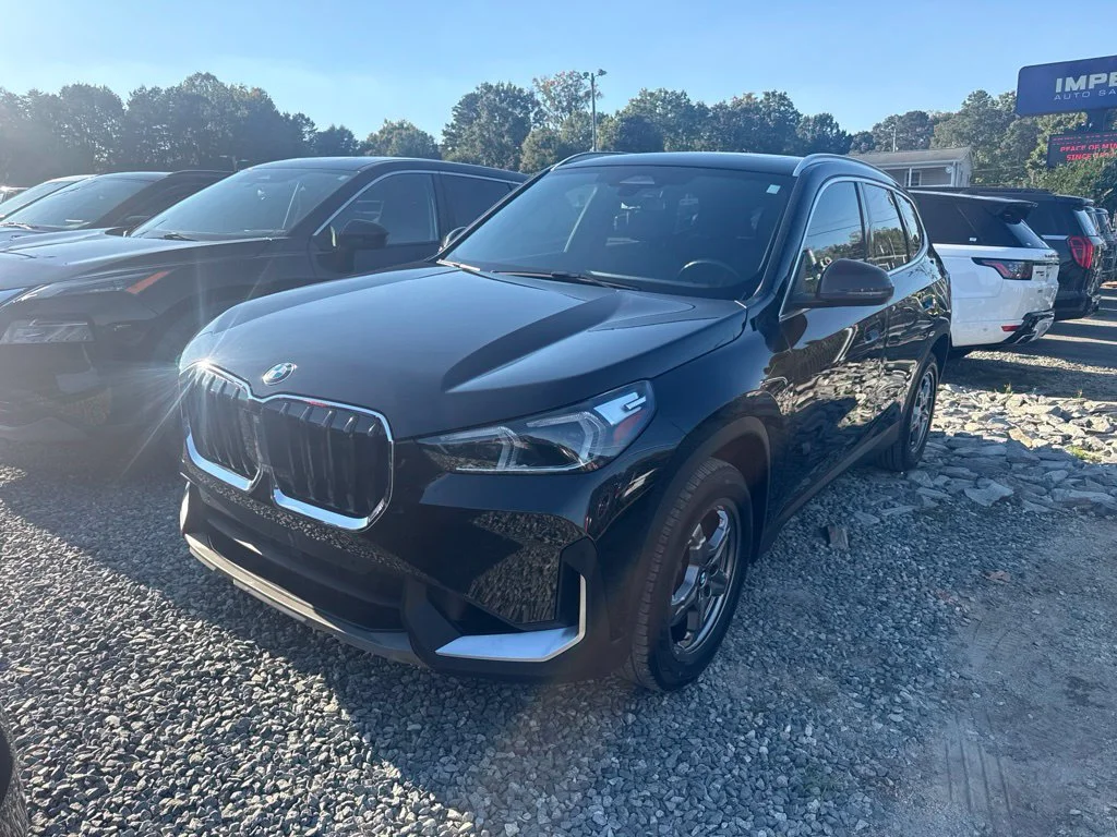 Used 2023 Black BMW xDrive28i image 1
