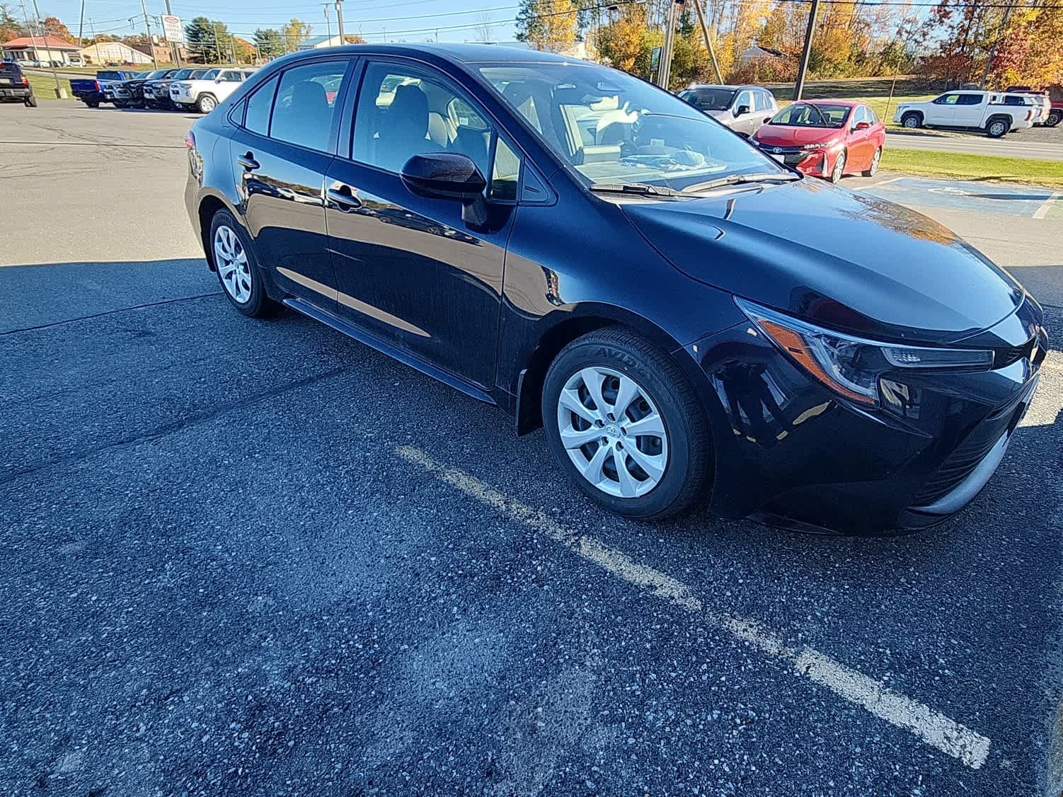 Used 2024 Midnight Black Metallic Toyota LE image 3