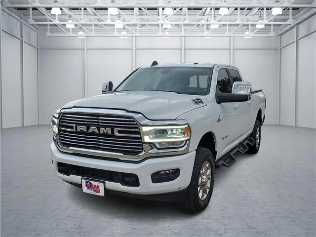 Used 2024 Bright White Clearcoat RAM Laramie 4x4 Crew Cab 6.3 ft. box 149 in. WB image 1