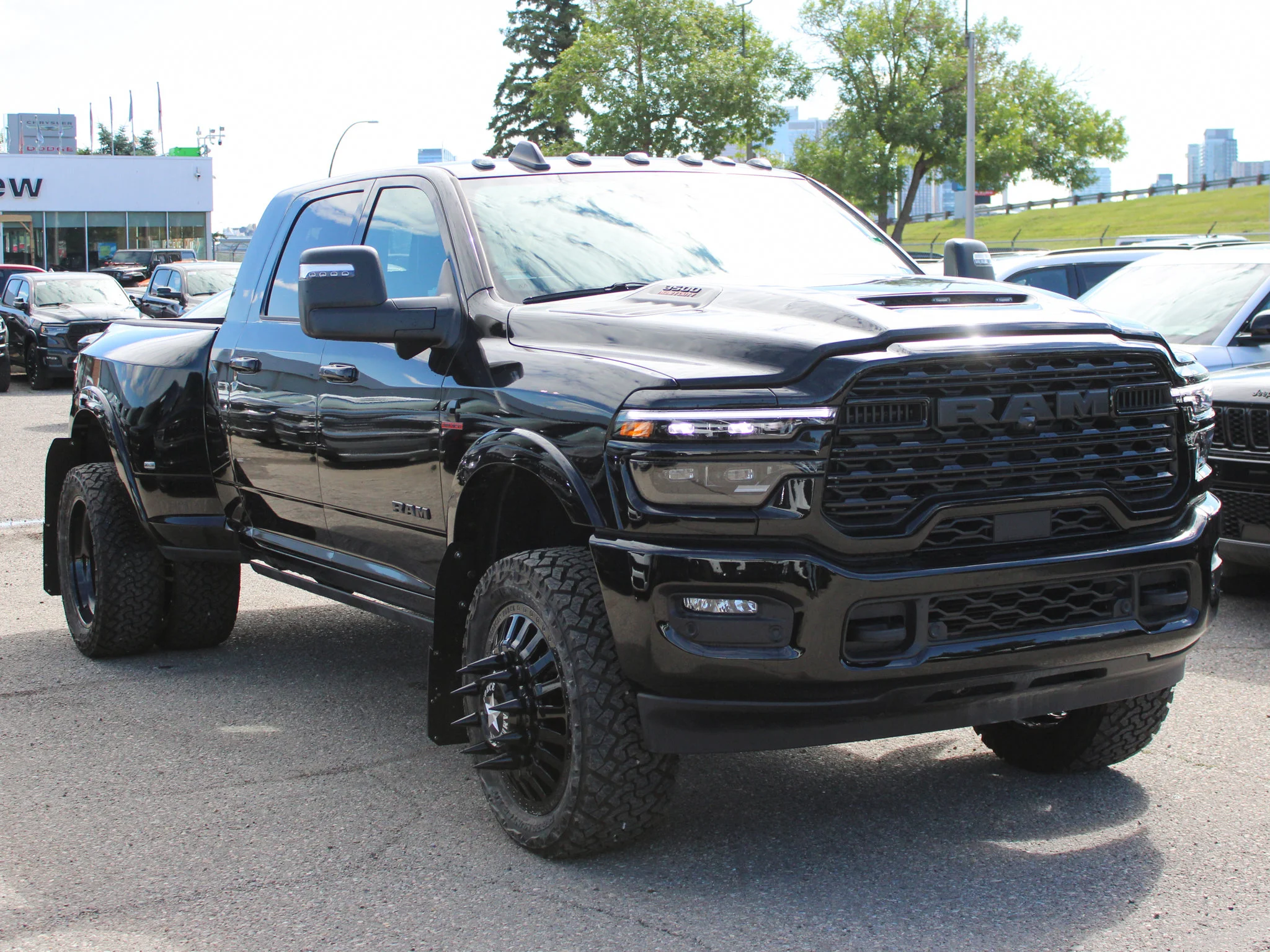 New 2026 Black RAM Limited* Mega Cab, 2 Inch Lift, 22 Inch American Force Wheels image 10