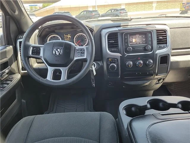 Used 2024 Granite Crystal Metallic Clearcoat RAM SLT 4x2 Crew Cab 5.6 ft. box 140 in. WB image 9