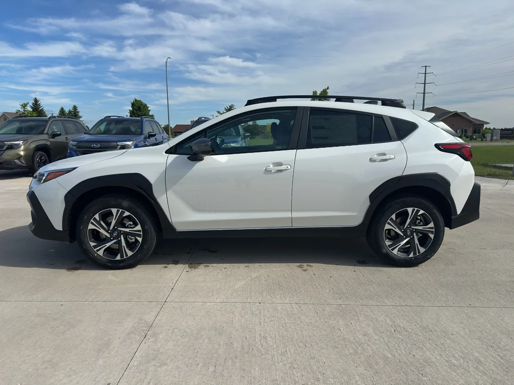 New 2026 CRYSTAL WHITE PEARL Subaru Premium image 1