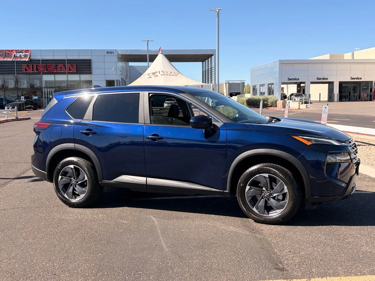 Used 2025 Deep Ocean Blue Pearl Nissan SV image 5