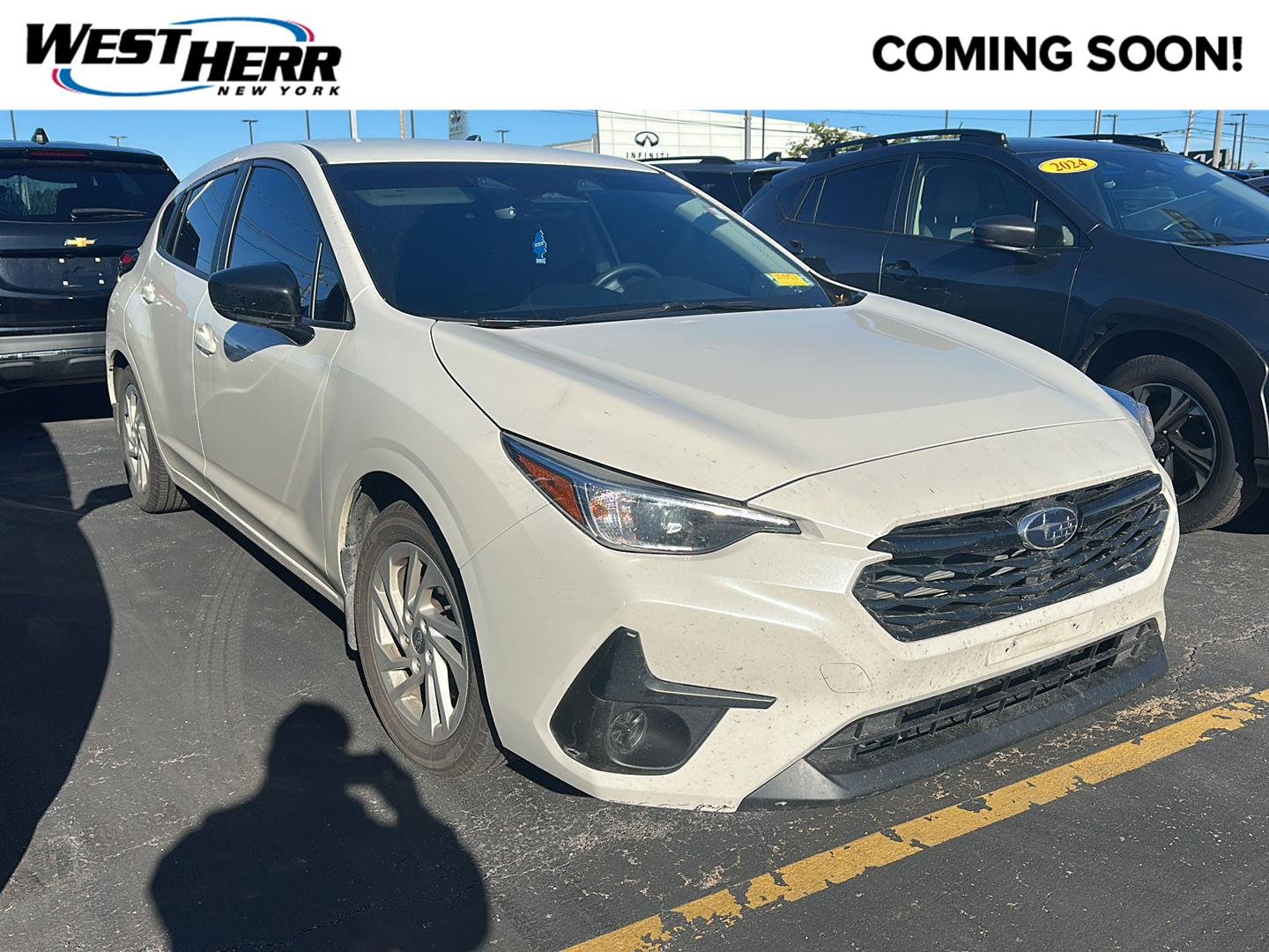 Used 2024 Crystal White Pearl Subaru Base image 1