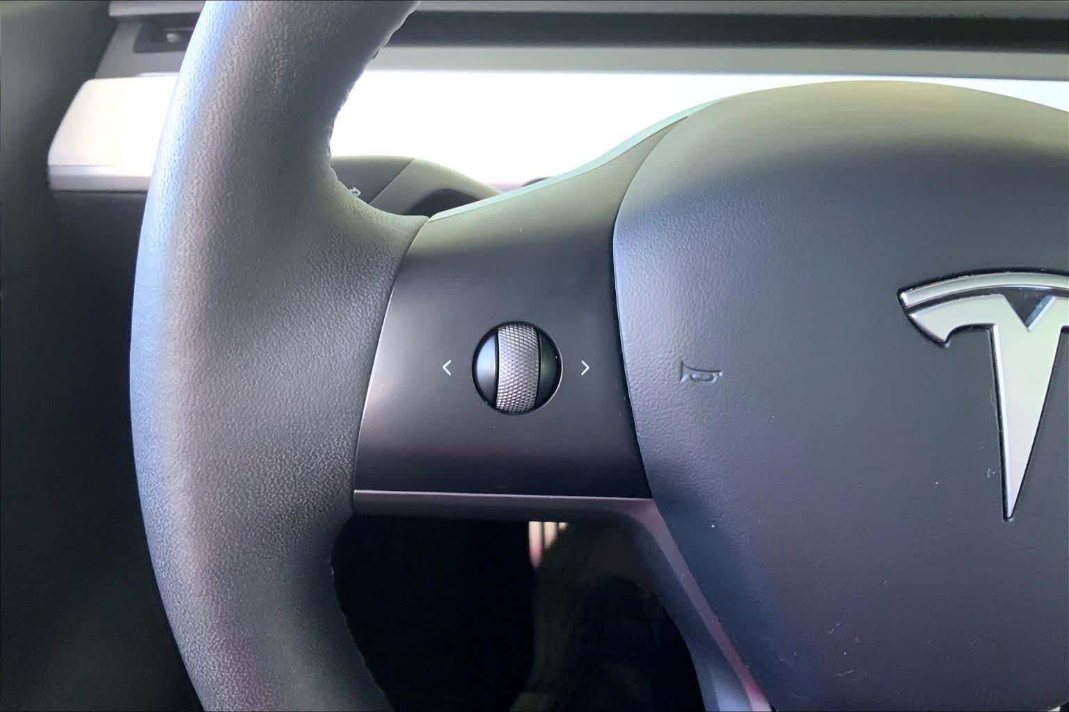 Used 2021 Solid Black Tesla Performance image 23