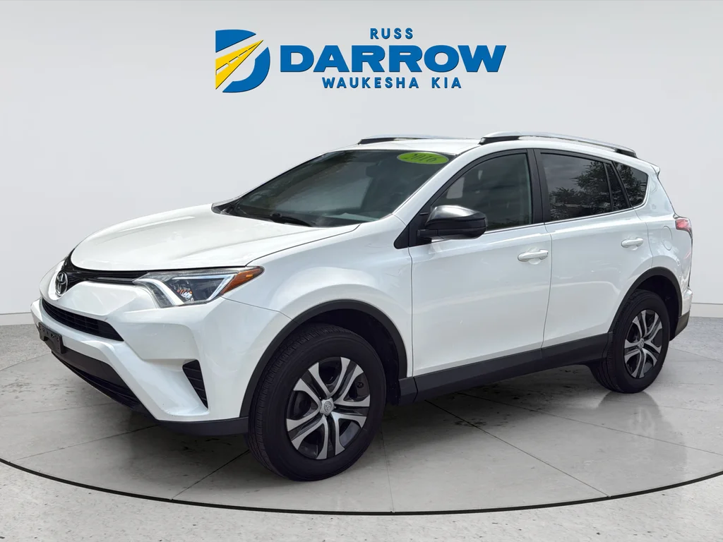 Used 2016 White Toyota LE image 1
