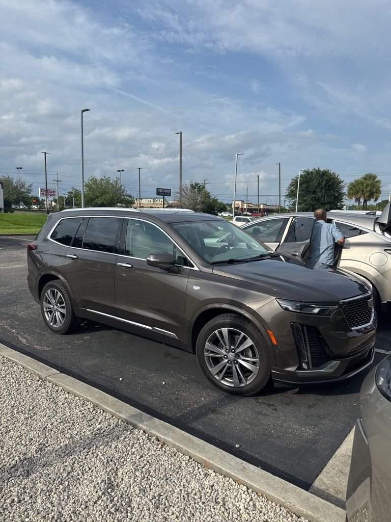 Used 2020 Brown Cadillac Premium Luxury image 1