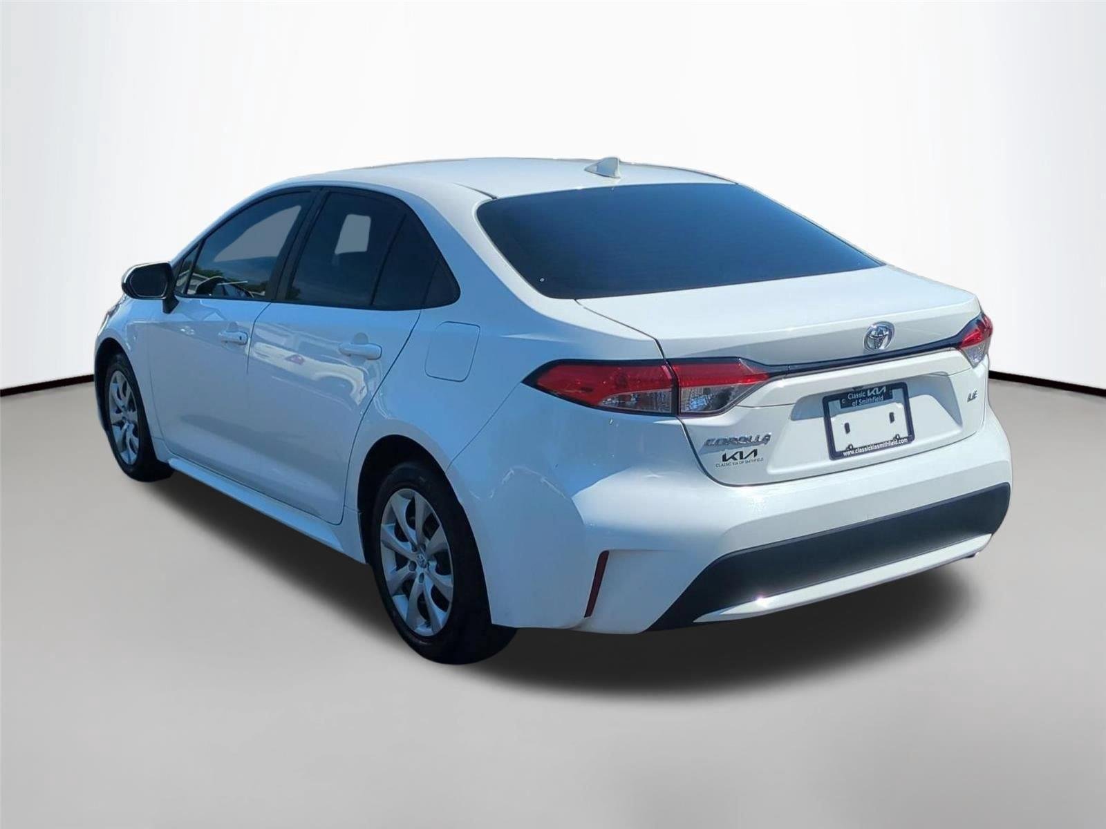 Used 2021 Super White Toyota LE image 3
