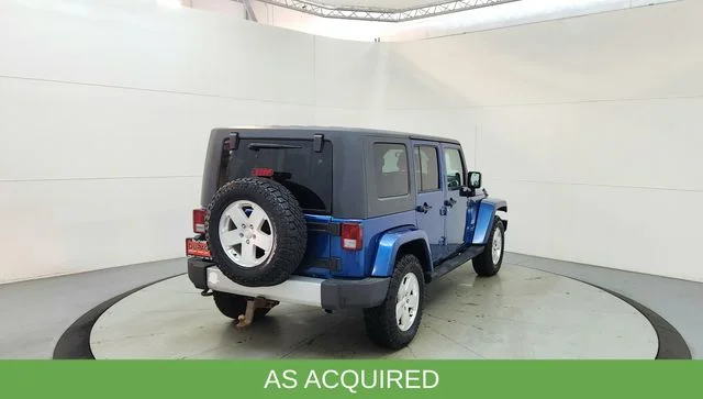 Used 2010 Blue Jeep Unlimited Sahara image 9