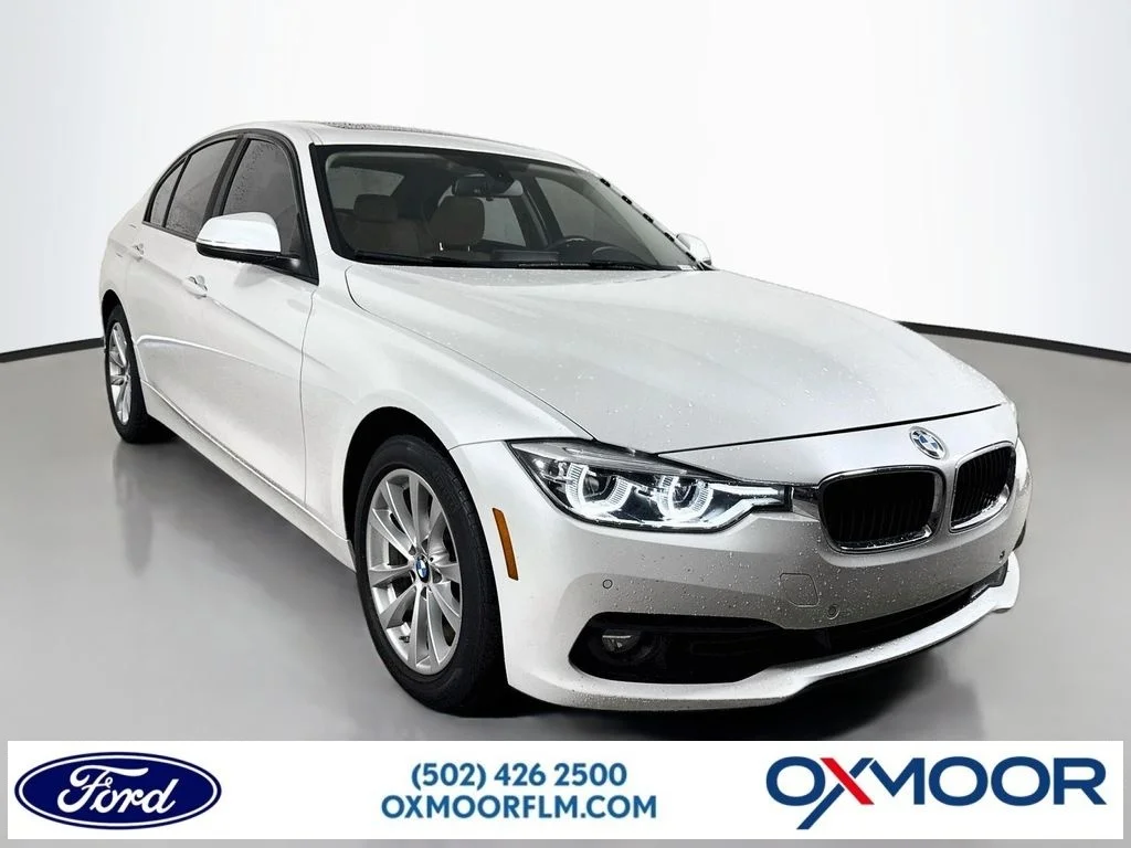 Used 2018 Mineral White Metallic BMW 320i xDrive image 1