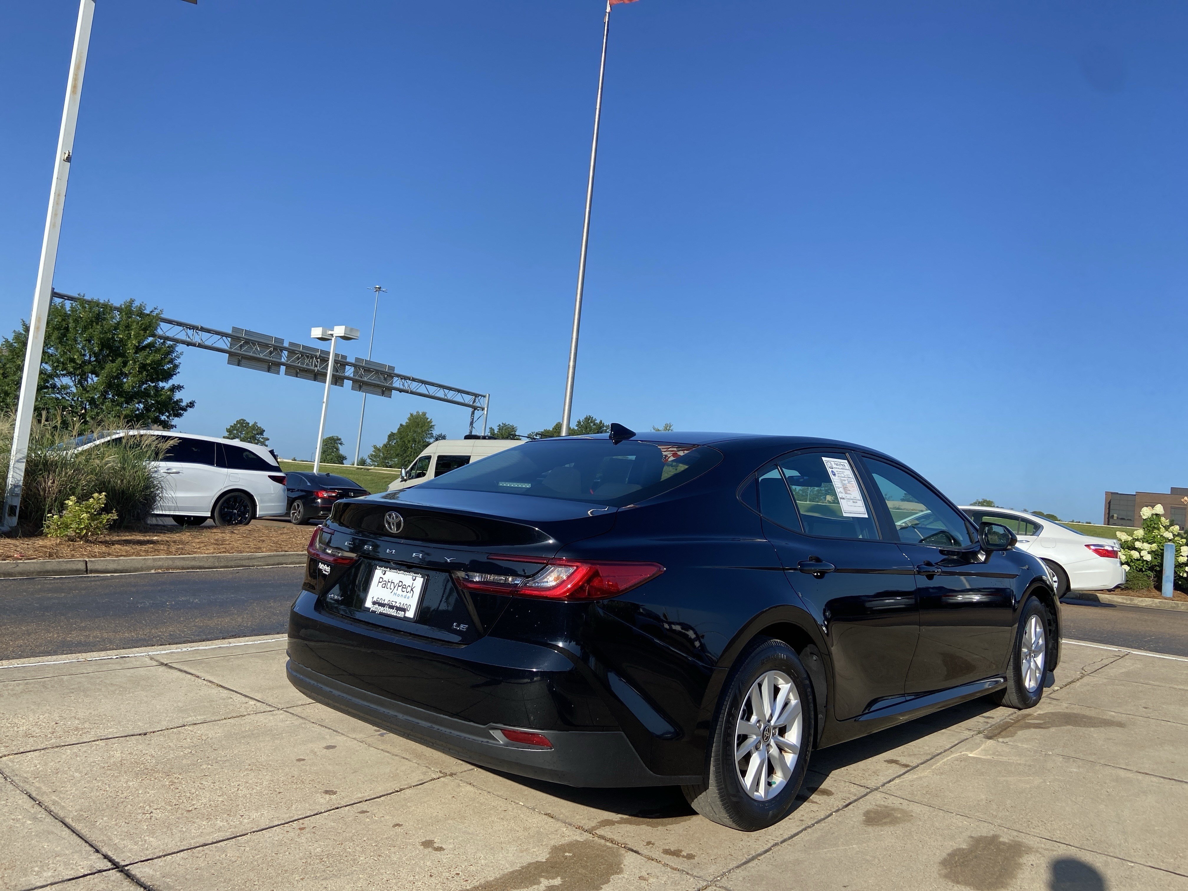Used 2025 Midnight Black Metallic Toyota LE image 14