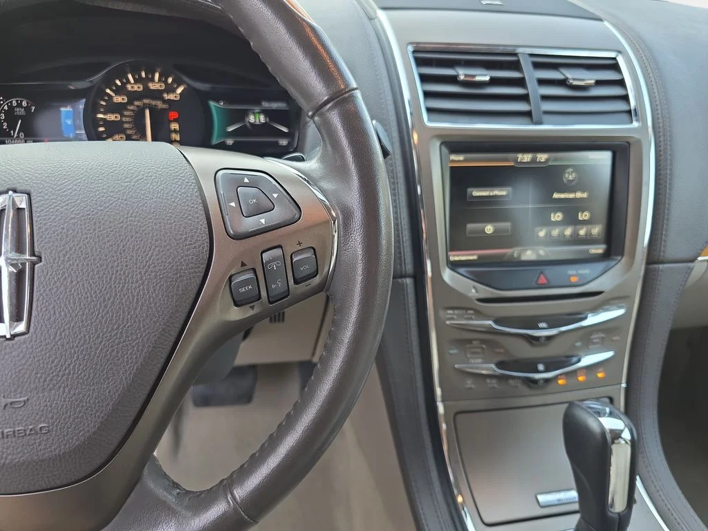 Used 2014 Smoked Quartz Metallic Tinted Clearcoat Lincoln Base image 19