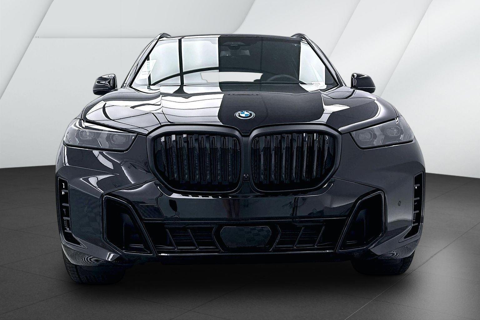 New 2026 Black Sapphire Metallic BMW xDrive50e image 2