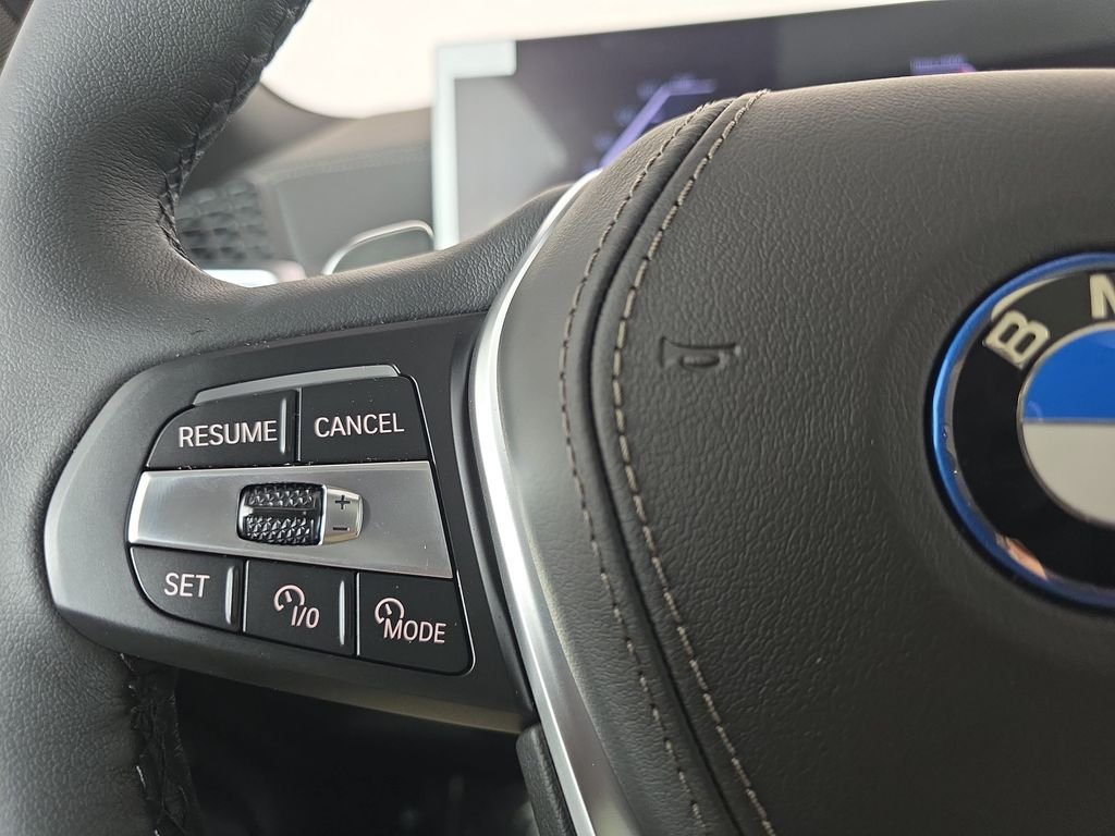 New 2026 Tanzanite Blue II Metallic BMW xDrive50e image 17