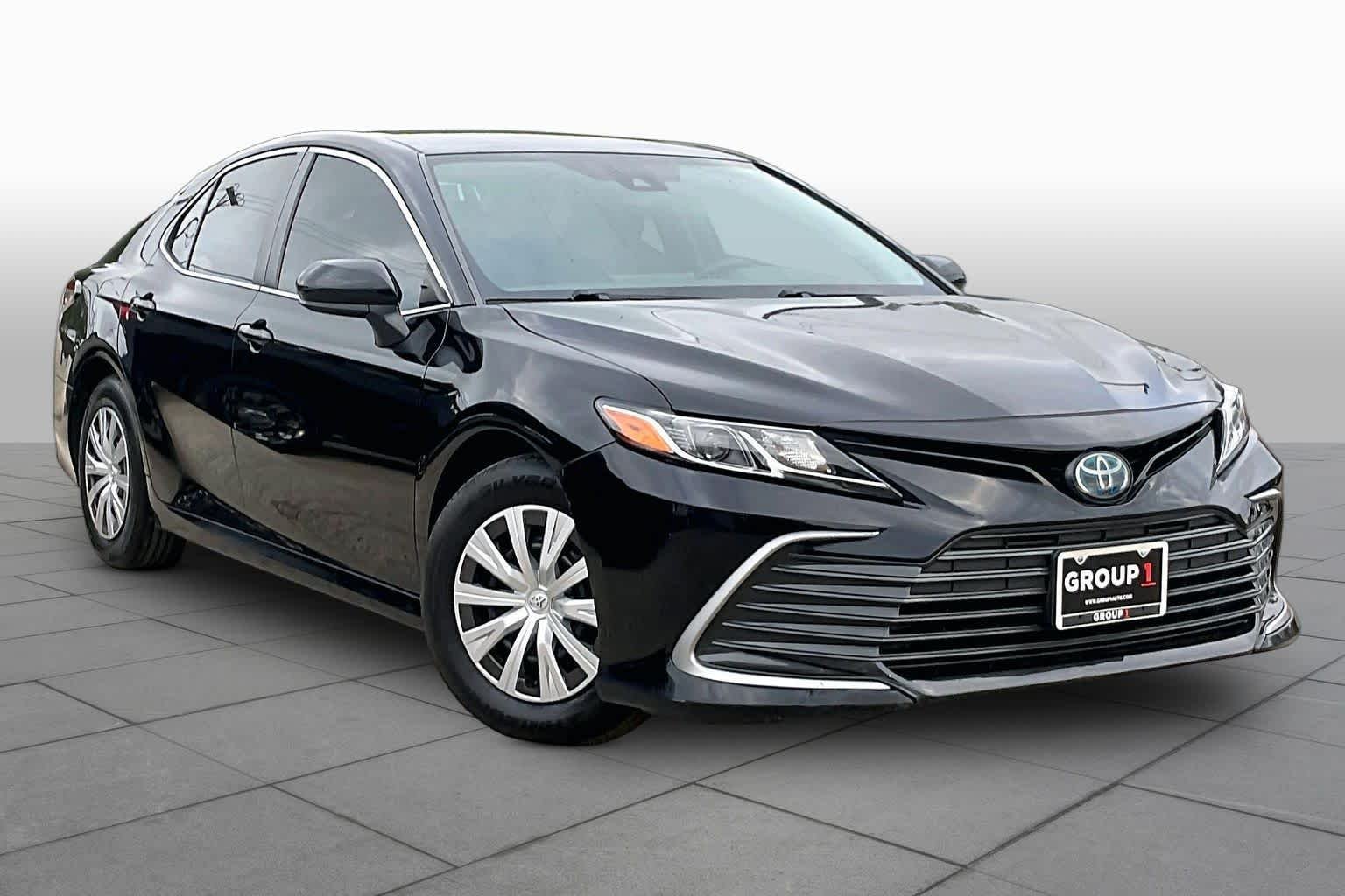 Used 2022 Midnight Black Metallic Toyota Hybrid LE image 3
