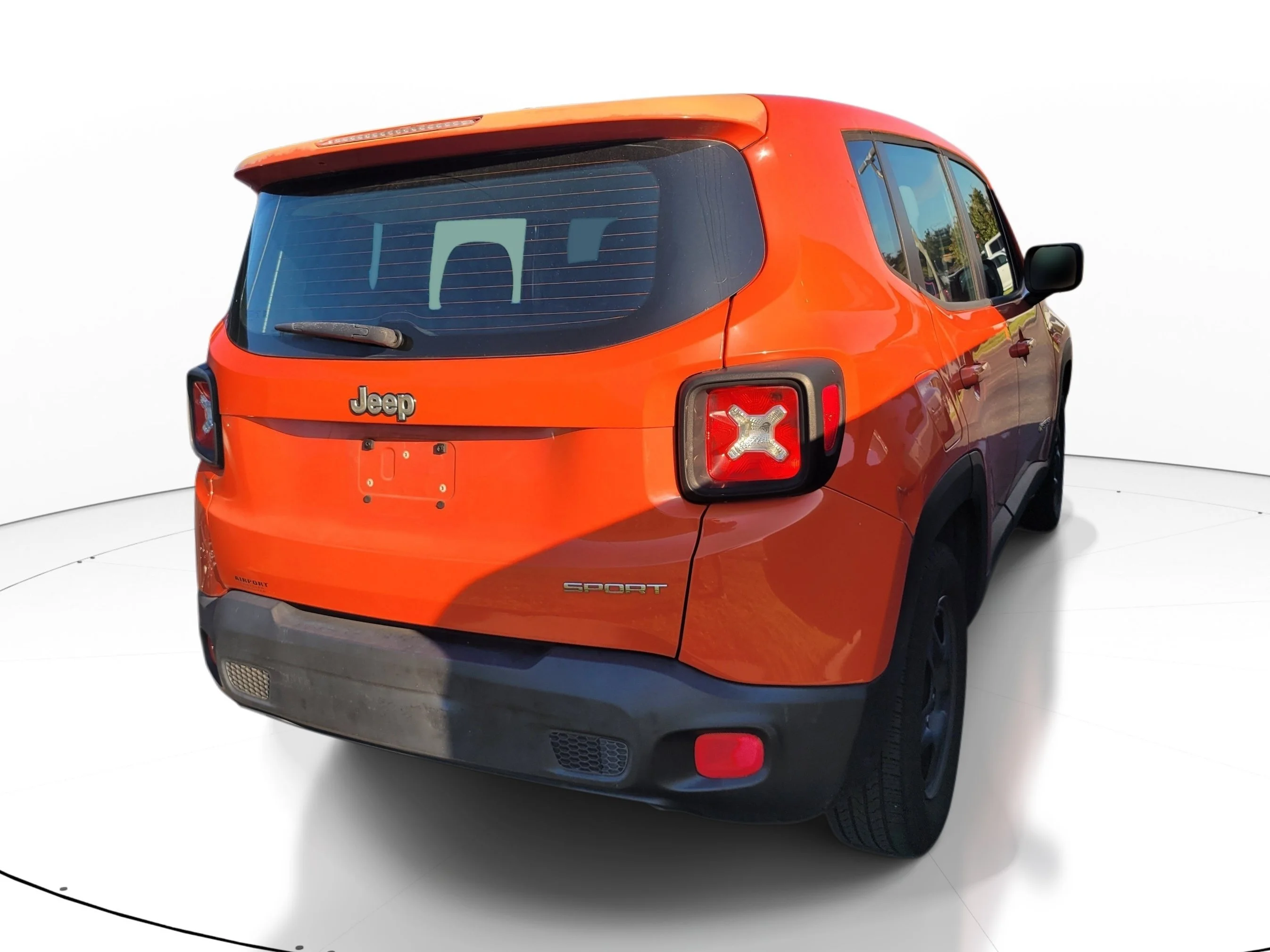 Used 2016 Omaha Orange Jeep Sport image 4
