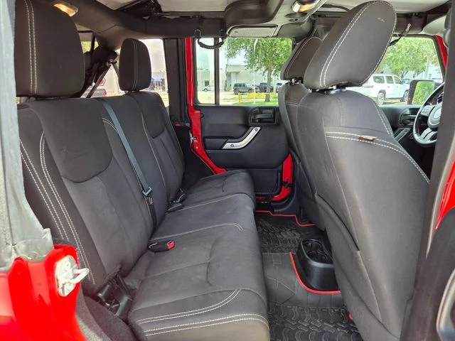Used 2015 Red Jeep Unlimited Sahara image 17